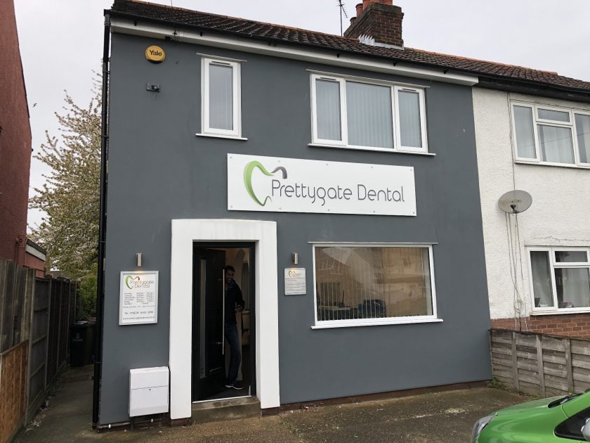 Building Signs. Fascia Board sign reading Prettygate Dental. Produced by Impact Signs